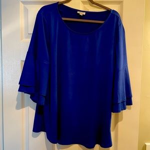 Beautiful flowing royal blue blouse . Previously worn. Great used condition.